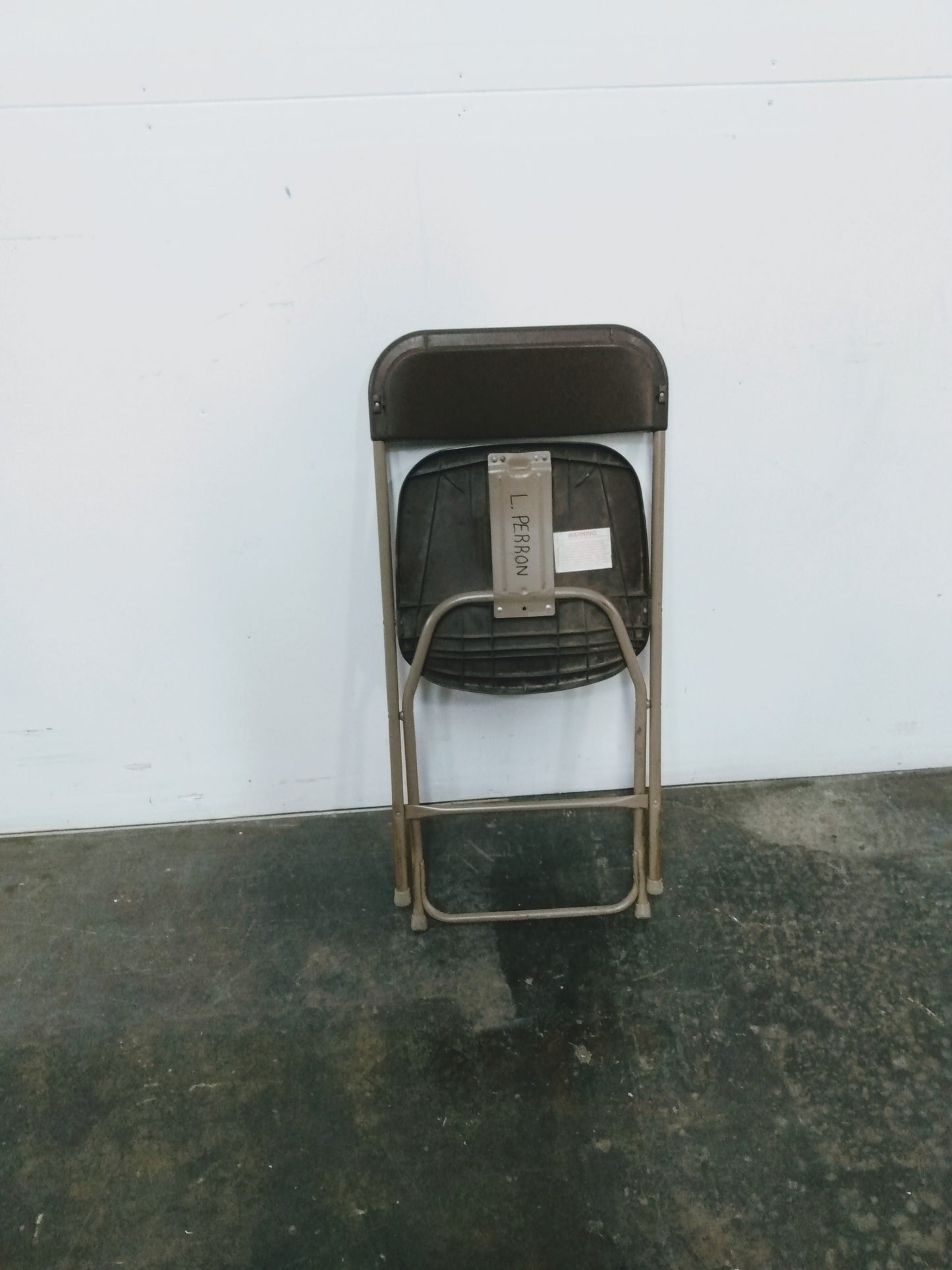 Chaise pliante brune