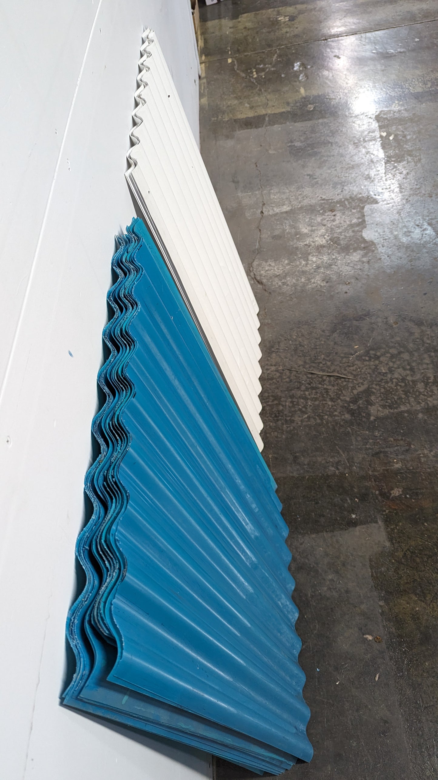 Panneaux ondulés en plastique
