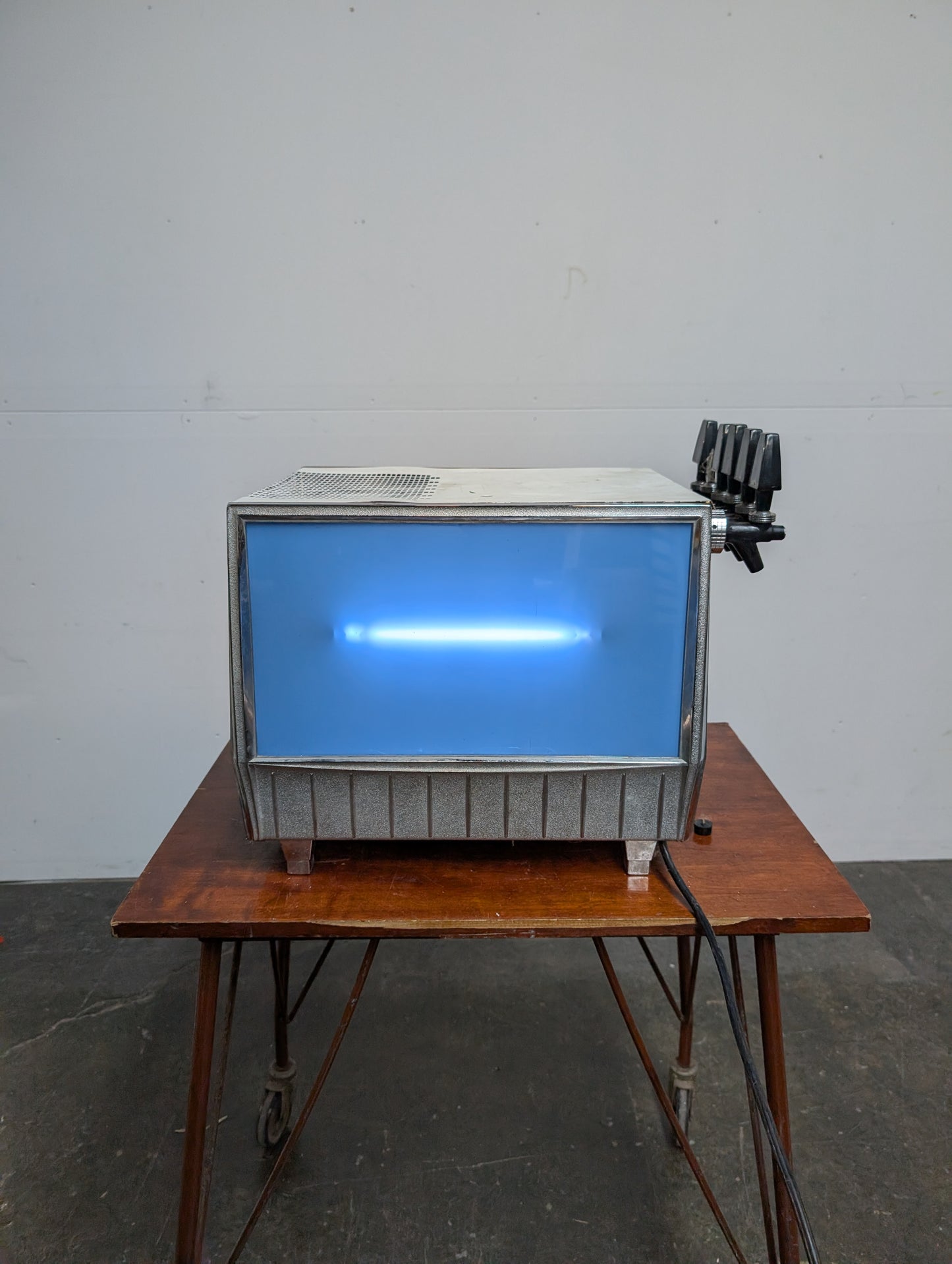 Distributeur de liqueurs en fontaine non fonctionnel