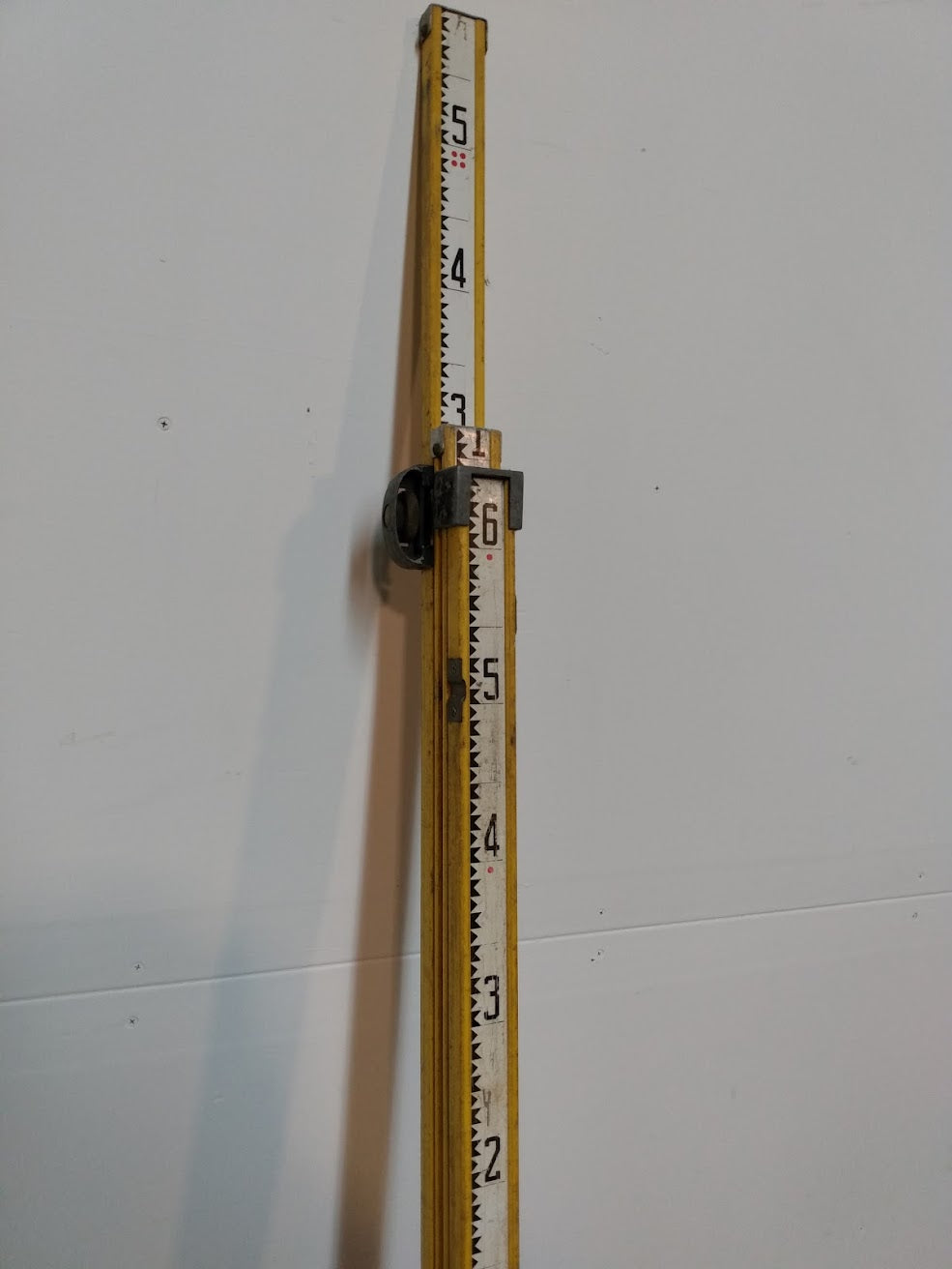 Bâton de mesure télescopique jaune