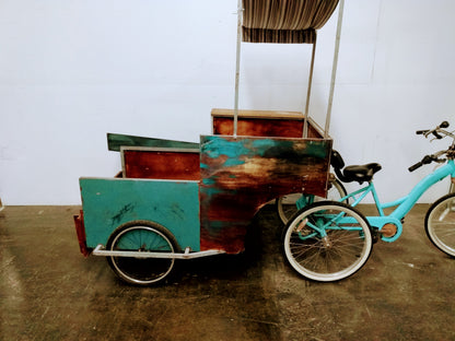 Tricycle et chariot adapté