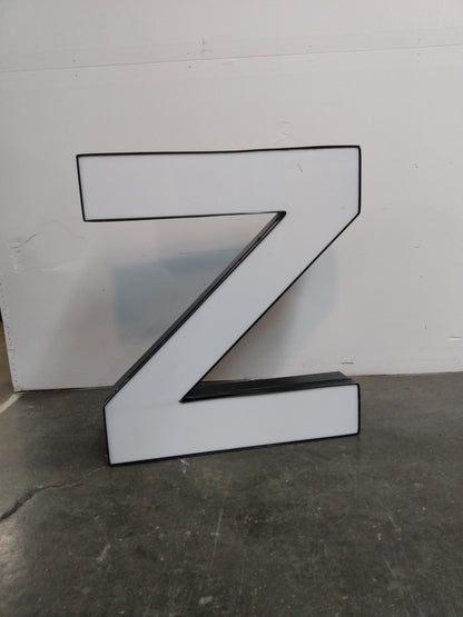 Lettres géantes blanches